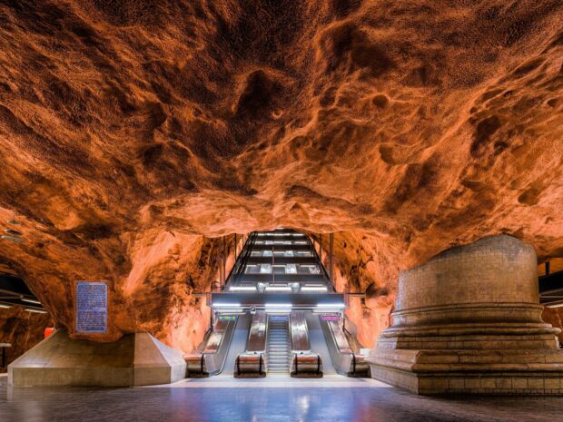 Underground station interior with rocky ceiling in Stockholm metro station