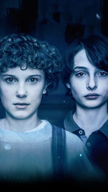 The artwork features Finn Wolfhard with a blue tone highlighting his face, HD Phone Wallpaper