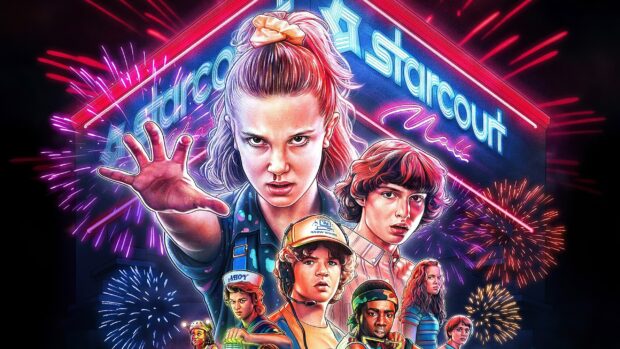 The Stranger Things cast poses in front of the neon Starcourt Mall with fireworks, 2K Desktop Wallpaper