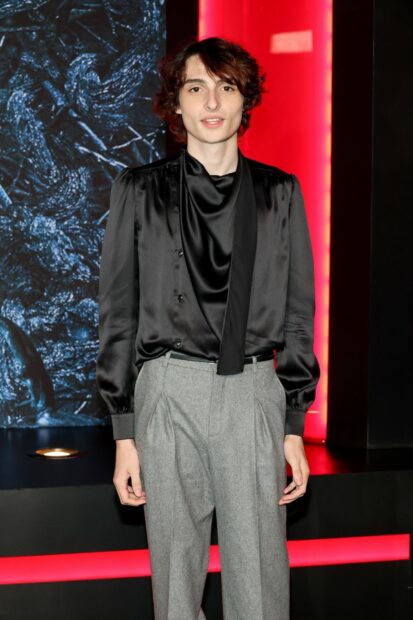 Finn Wolfhard wallpapers show him in a sleek black silk shirt and grey trousers, HD Desktop Wallpaper