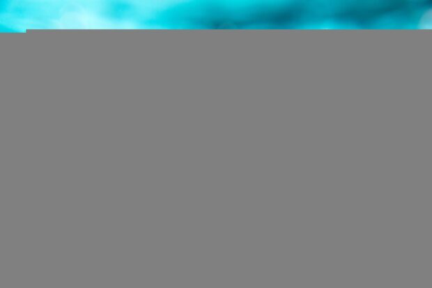 A swimming pool with lanes and clear blue water showing swimming activities