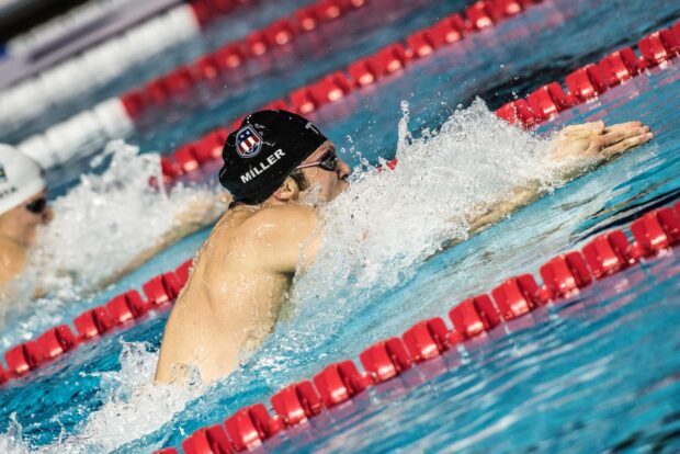 Competitive swimmer in action during a swimming race in a pool