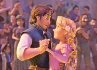 Rapunzel and Flynn Rider sharing a dance in Tangled scene with crowd applauding behind