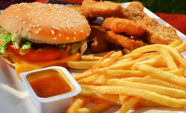 Golden french fries served with crispy chicken strips, 2K Desktop Wallpaper