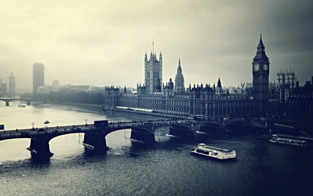 The River Thames Wallpapers show a boat on the River Thames near historic buildings in London, HD Desktop Wallpaper