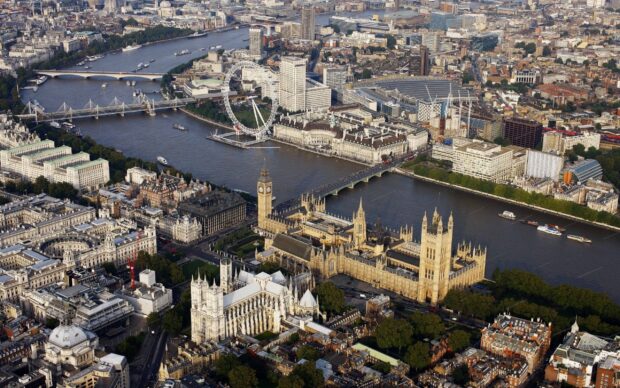 Aerial view of the River Thames with the London Eye and historic buildings along the river, 2K Desktop Wallpaper