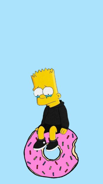 Bart Simpson sitting sadly on a giant donut with sprinkles