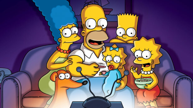 The Simpsons characters enjoying family time watching TV on the couch