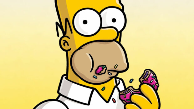 Homer Simpson eating a donut with pink icing in The Simpsons