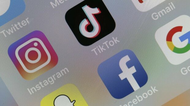 Close up of social media apps including TikTok on a smartphone screen