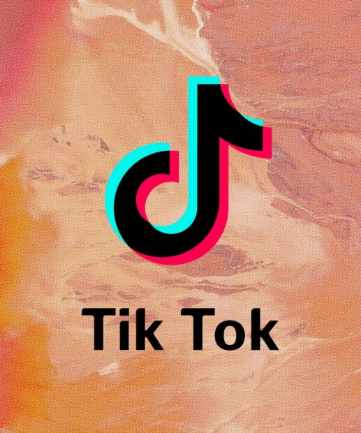 Tik Tok logo on a colorful abstract background with vibrant shades of orange and pink