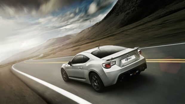 Filename: toyota-gt86-sports-car-driving-on-mountain-road.jpg.
