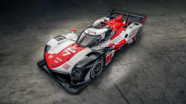 Race car, hybrid hypercar, Toyota GR002, racing vehicle, motorsport, endurance racing, Le Mans, hypercar design.