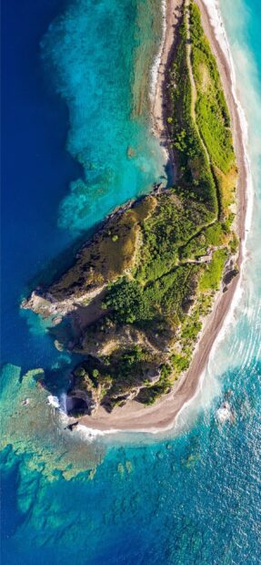 Aerial view of Dominica Island showing vibrant blue waters and lush green vegetation, 2K Mobile Wallpaper