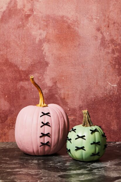 Halloween pumpkins are decorated with black ribbons on pink and green gourds, HD Desktop Wallpaper