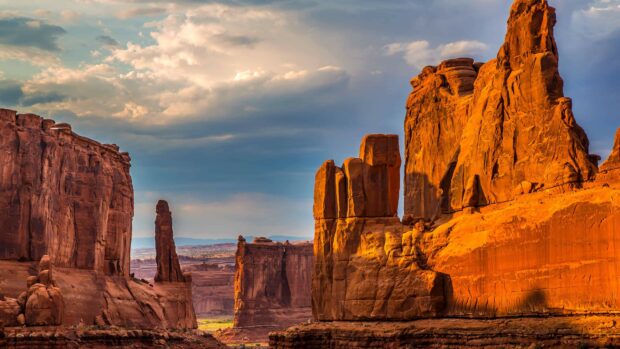 Red rock formations in United States desert landscape under a cloudy sky