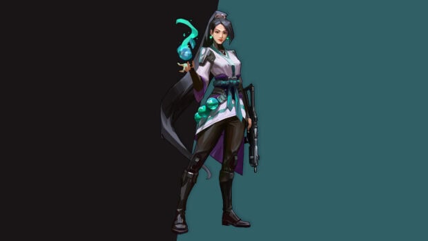 A Valorant character holding a glowing blue orb and a gun standing confidently in detailed attire
