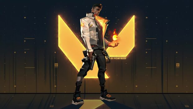A Valorant character holding a gun with a glowing fireball in hand standing before a bright yellow symbol