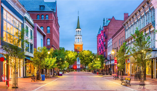 A charming Vermont city street with historic buildings and vibrant evening lights, HD Desktop Wallpaper