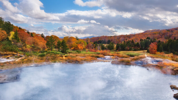A peaceful view of Vermont featuring colorful autumn trees by a misty lake, 4K Desktop Wallpaper