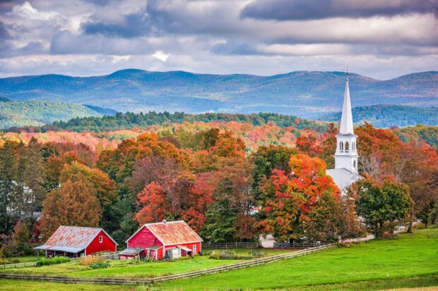 A scenic view of Vermont with autumn trees, red barns, and a white church steeple, HD Desktop Wallpaper
