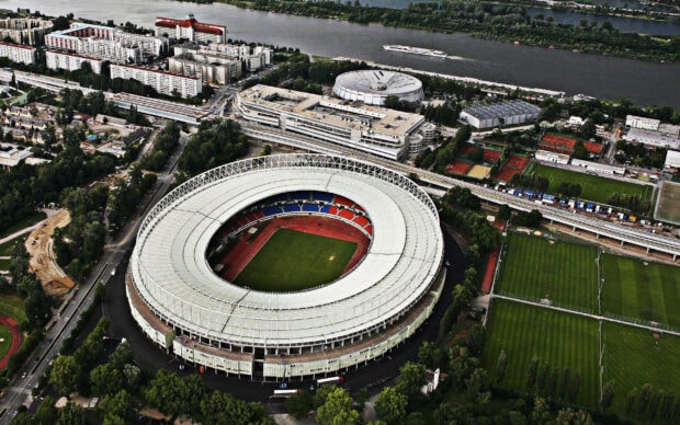 Aerial view of Vienna Austria stadium surrounded by sports fields and residential buildings