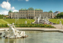Beautiful Vienna palace and garden sculpture in Austria with clear sky