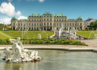 Beautiful Vienna palace and garden sculpture in Austria with clear sky