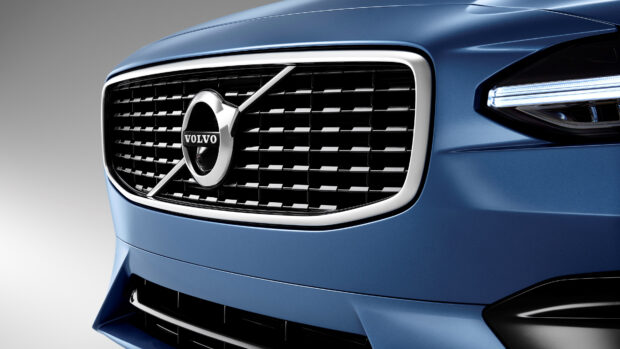Close up view of Volvo car grille with blue paint finish
