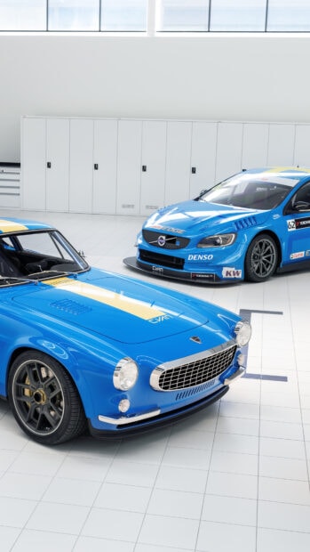 Classic and modern Volvo cars in blue showcased in a bright garage setting