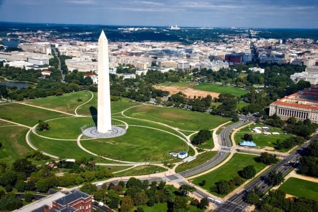 Aerial view of Washington Monument and surrounding cityscape in Washington DC