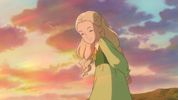 A smiling girl from When Marnie Was There anime stands under a colorful sunset sky