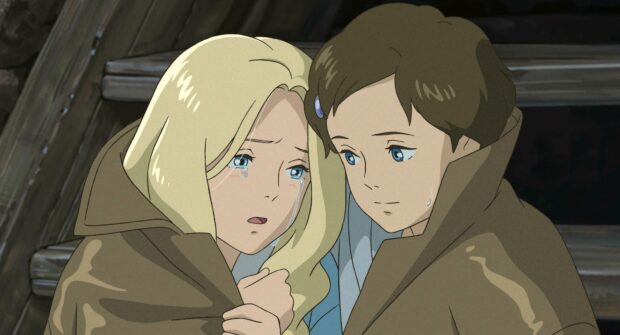 A touching scene from When Marnie Was There anime showing two characters sharing a moment of comfort