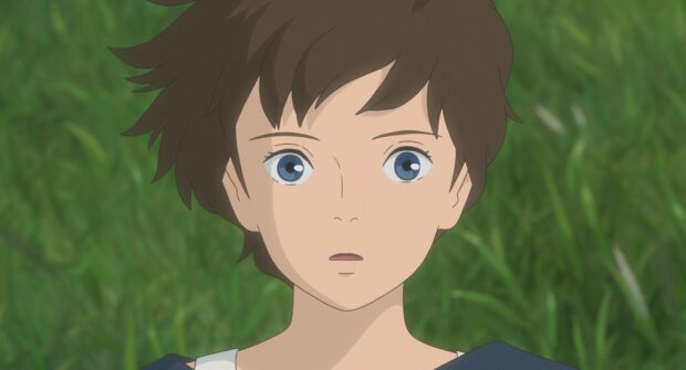 The boy with blue eyes looking surprised in When Marnie Was There anime