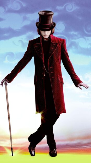 Willy Wonka wearing a red coat and top hat standing with a cane on a colorful background
