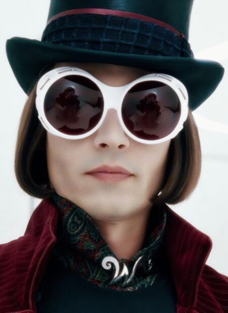 Close up of Willy Wonka with unique sunglasses and top hat in high quality