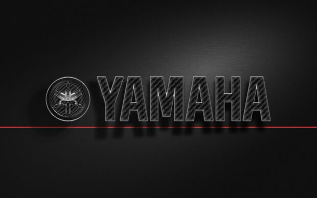 Carbon fiber texture with Yamaha logo and brand name on a black background