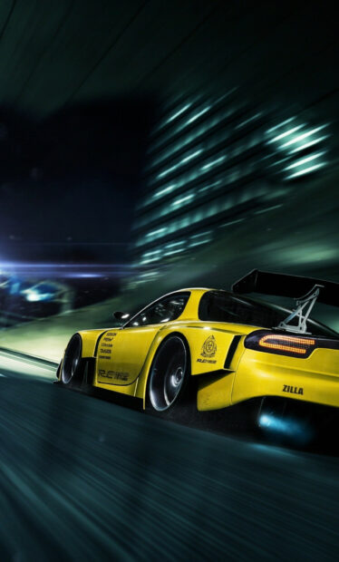 A yellow sports car is speeding through a city at night showing dynamic motion and light effects with Mazda Wallpapers, HD Phone Wallpaper