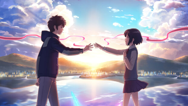Two characters from Your Name reach out under a glowing sunset sky, 4K Desktop Wallpaper