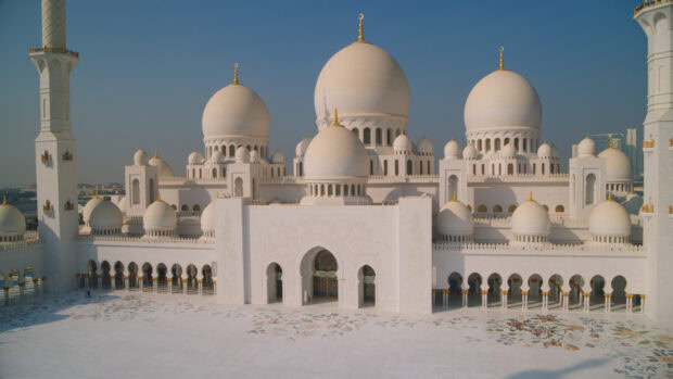 The beautiful mosque domes in Abu Dhabi with clear blue sky in 4k quality