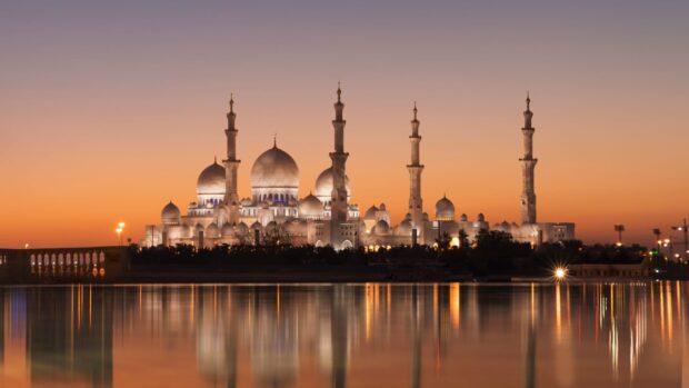 Sheikh Zayed mosque landmarks at sunset in Abu Dhabi cityscape