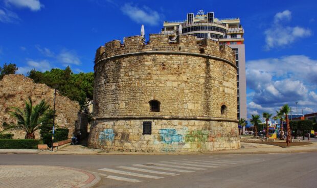 The historic Albanian landmark with old stone walls under a clear blue sky