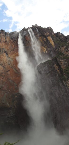 Angel Falls waterfall cascading down a steep cliff in a lush natural landscape