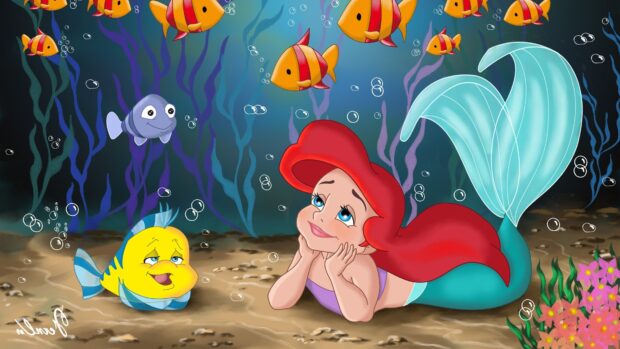 Ariel The Little Mermaid character lying on the sea floor with colorful fish around