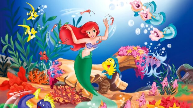 Ariel The Little Mermaid swimming underwater surrounded by colorful sea creatures and coral reefs
