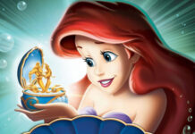 Ariel The Little Mermaid holding a golden mermaid figurine in an underwater scene
