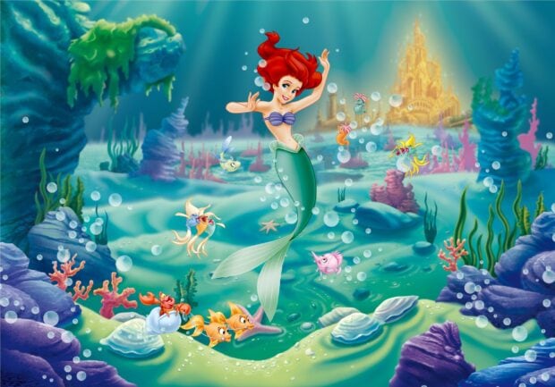 Ariel The Little Mermaid swimming underwater with colorful sea creatures and a coral castle background