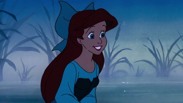 Ariel from The Little Mermaid in a blue dress with a big bow in a marsh setting