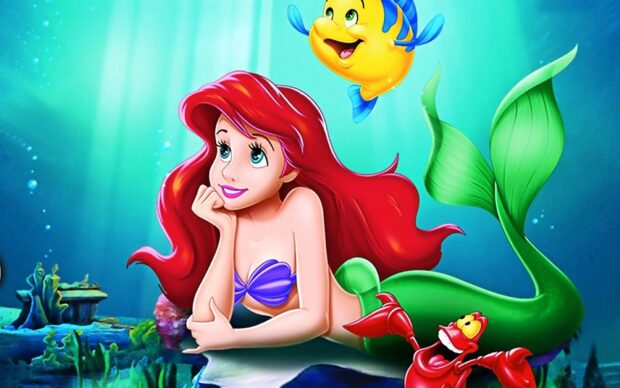 Ariel The Little Mermaid character with underwater friends in an animated ocean scene