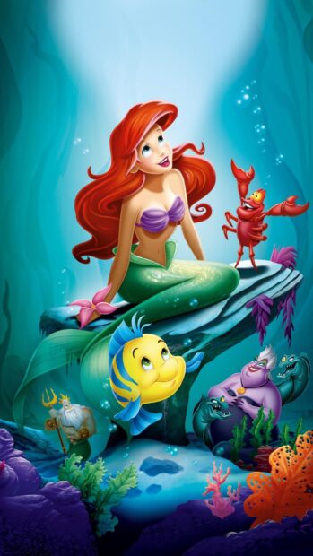 Ariel with the little mermaid characters under the sea including fish crab and sea witch